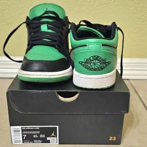 Air Jordan 1 Low Green and Black Sneakers