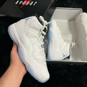 Air Jordan 11 Retro White and Blue Sneakers