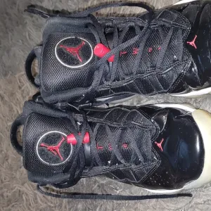 Air Jordan Black and Red Sneakers