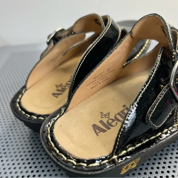 Alegria Black Shoes with Glossy Finish and Adjustable Buckle