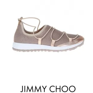 Beige Andrea shoes with metallic trim from Jimmy Choo.