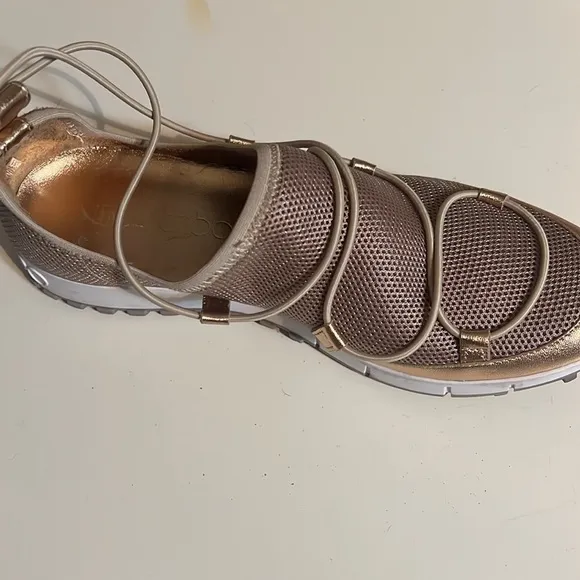 Beige Andrea shoes with metallic trim from Jimmy Choo.