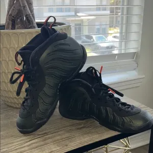 Black and Green Foamposite Sneakers