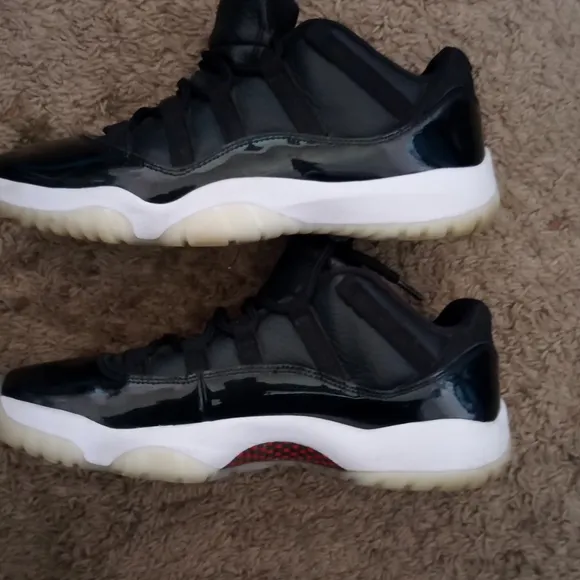 Black and White Low Top Jordan 11 Mens Sneakers Size 10