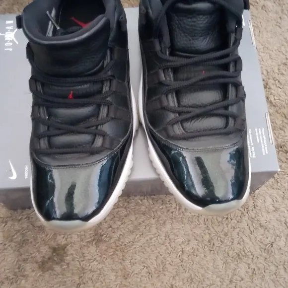 Black and White Low Top Jordan 11 Mens Sneakers Size 10