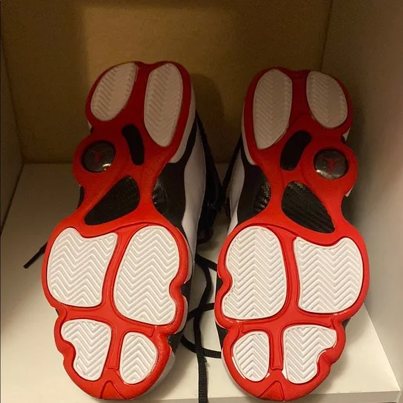 Black and White Sneakers with Red Accents