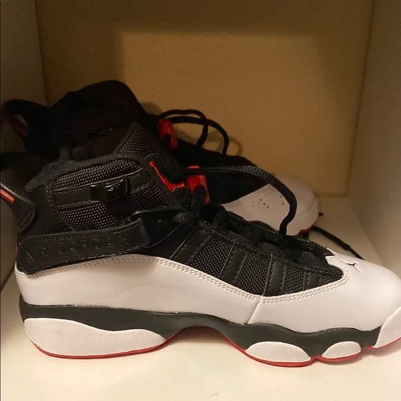 Black and White Sneakers with Red Accents