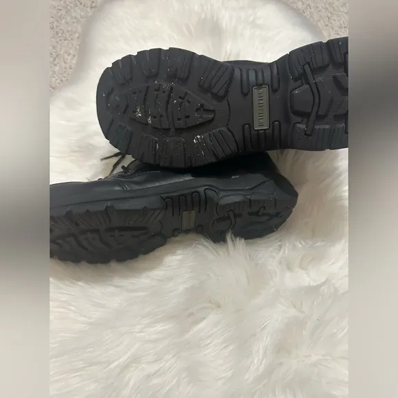 Black Tactical Boots with Durable Construction and Lace-Up Design