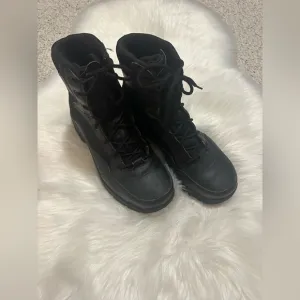 Black Tactical Boots with Durable Construction and Lace-Up Design