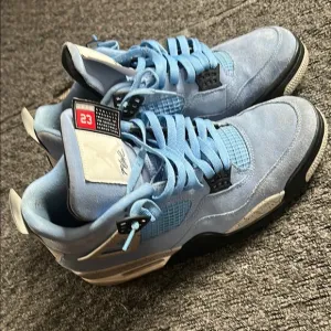 Blue Suede Sneakers with Black and White Accents