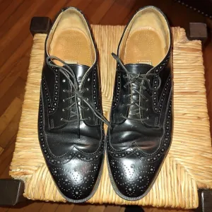Cole Haan Black Wingtip Shoes. Size 9.5