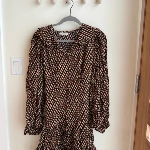DÔEN Camden ruffled floral-print jersey mini dress size Large
