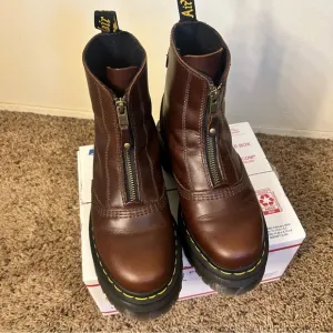 Dr. Martens zip front brown platform boots