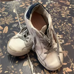 Golden Goose White and Gray Sneakers