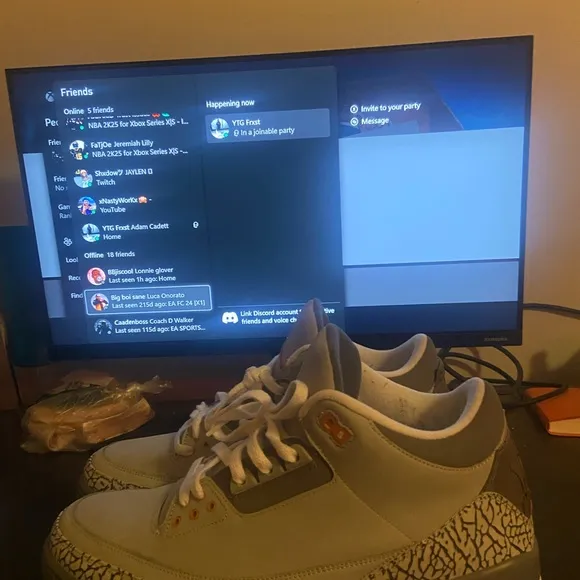 Gray and White Sneakers with Orange Accents