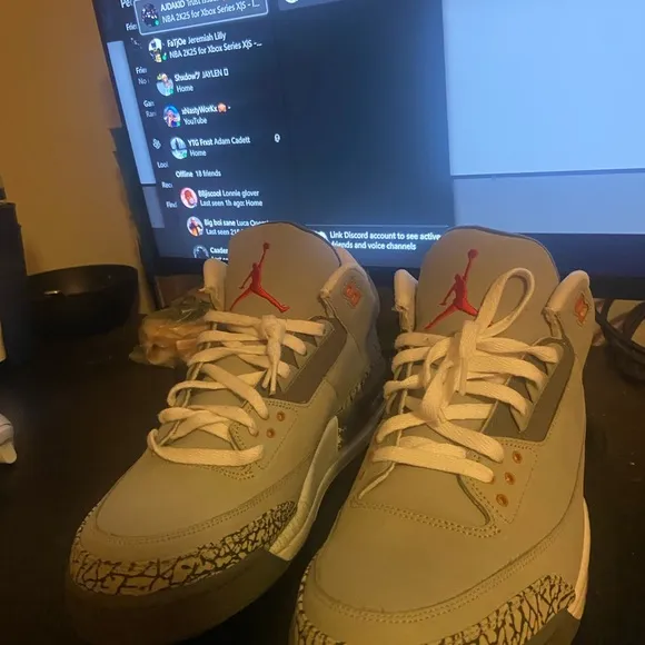 Gray and White Sneakers with Orange Accents