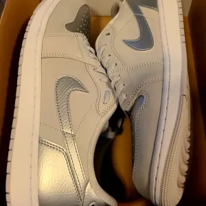 Jordan 1 Retros Men's Gray and Silver Sneakers NEW