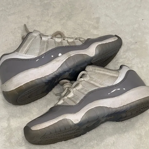 JORDAN 11 Retro Low Cement Gray and White Sneakers