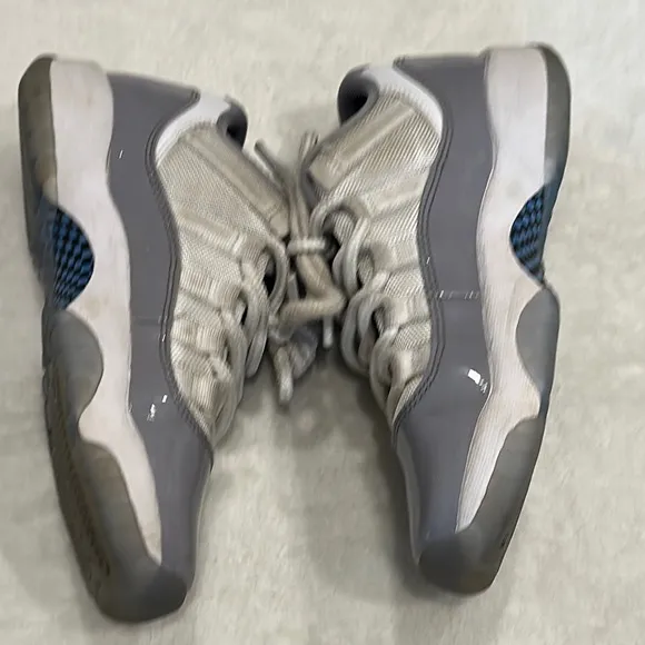 JORDAN 11 Retro Low Cement Gray and White Sneakers
