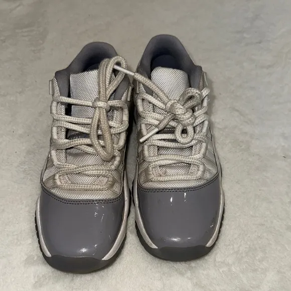 JORDAN 11 Retro Low Cement Gray and White Sneakers