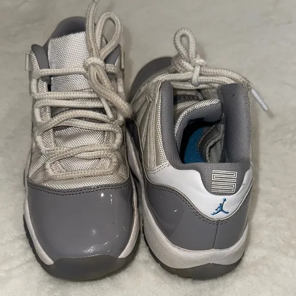 JORDAN 11 Retro Low Cement Gray and White Sneakers