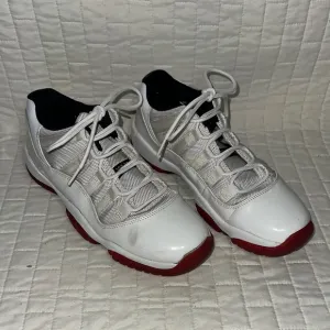 Jordan 11 XI Retro Low White.   White and Red Athletic Sneakers Kids 6.5Y
