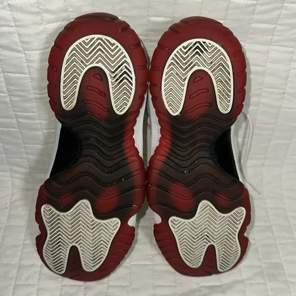 Jordan 11 XI Retro Low White.   White and Red Athletic Sneakers Kids 6.5Y