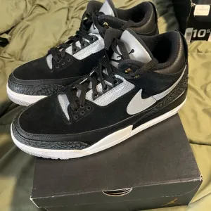 Jordan Black and Gray Sneakers with Iconic Design