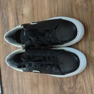 Karl Lagerfeld black and white men's sneakers size 9. Casual designer sneakers.