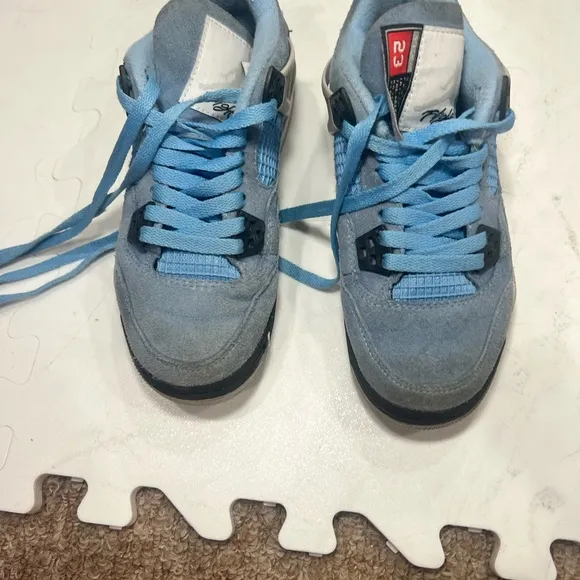 Light Blue Sneakers with Black Accents