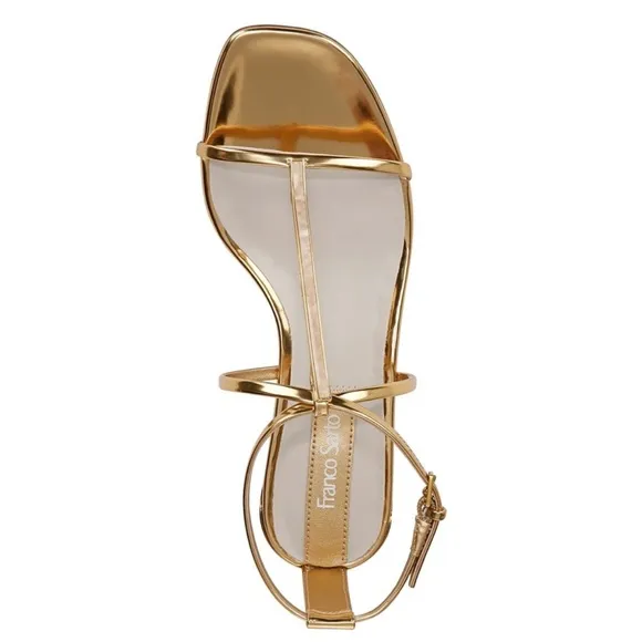 Metallic high-heel with ankle straps. Elegant Gold Stiletto Sandals.