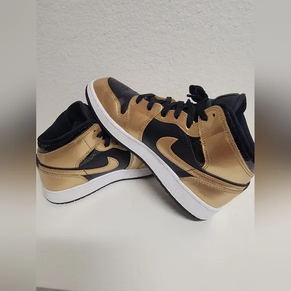 Nike Air Jordan Black and Gold Sneakers