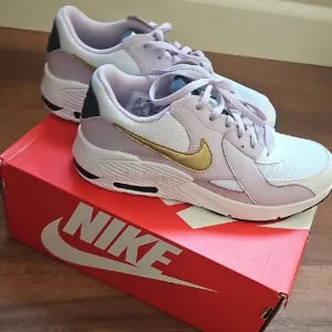Nike Air Max Sneakers in White and Gold