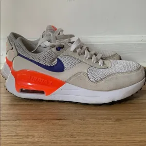 Nike Air Max Sneakers with Orange and Blue Accents