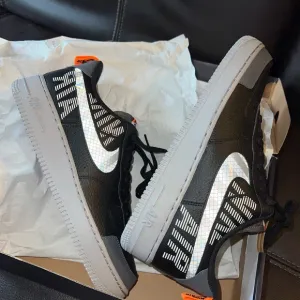 Nike Black and Gray Sneakers with White Accents