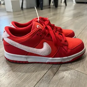 Nike Red Sneakers with White Swoosh