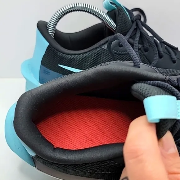 Nike | Team Hustle Quick smoke grey/magic ember low-top sneakers | WMS 7.5