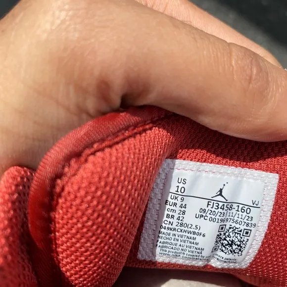 Nike White and Red Air Jordan 1s