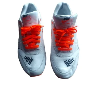 Nike White Sneakers with Orange Laces