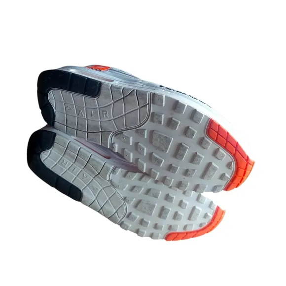 Nike White Sneakers with Orange Laces