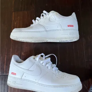 Nike x Supreme White Sneakers