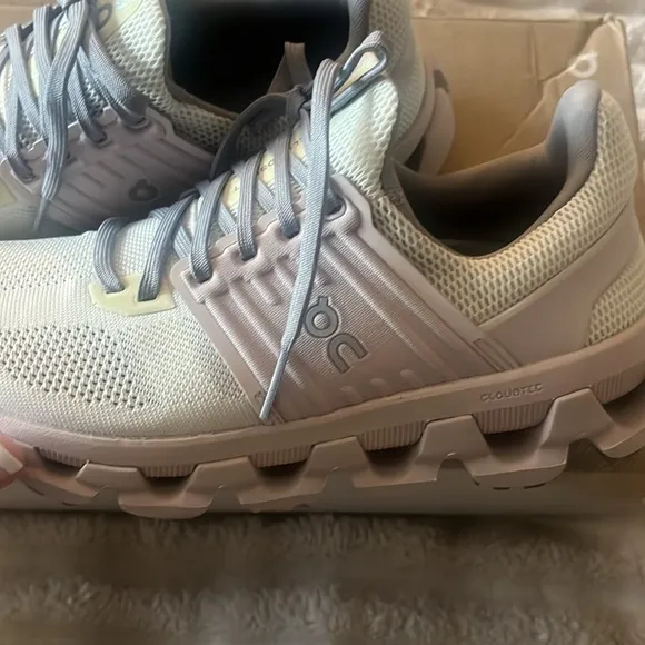 On Running White and Gray Sneakers