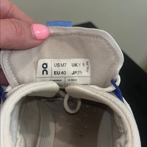 On White and Blue Athletic Sneakers