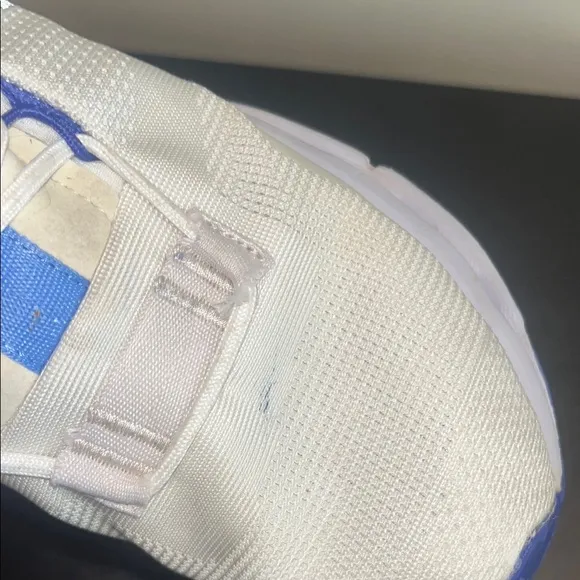 On White and Blue Athletic Sneakers