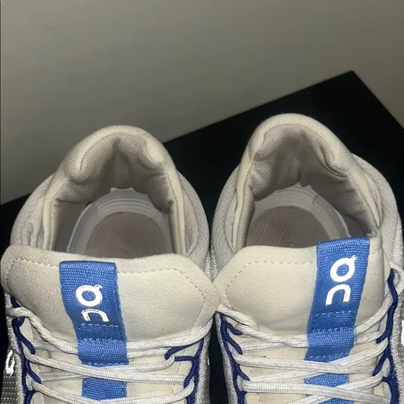 On White and Blue Athletic Sneakers