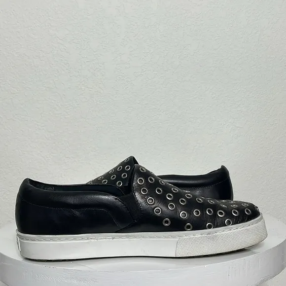 SCHUTZ GROMMET STUDDED BLACK LEATHER SLIP ON SNEAKERS