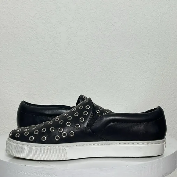 SCHUTZ GROMMET STUDDED BLACK LEATHER SLIP ON SNEAKERS