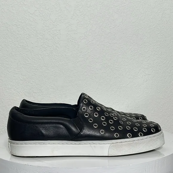 SCHUTZ GROMMET STUDDED BLACK LEATHER SLIP ON SNEAKERS
