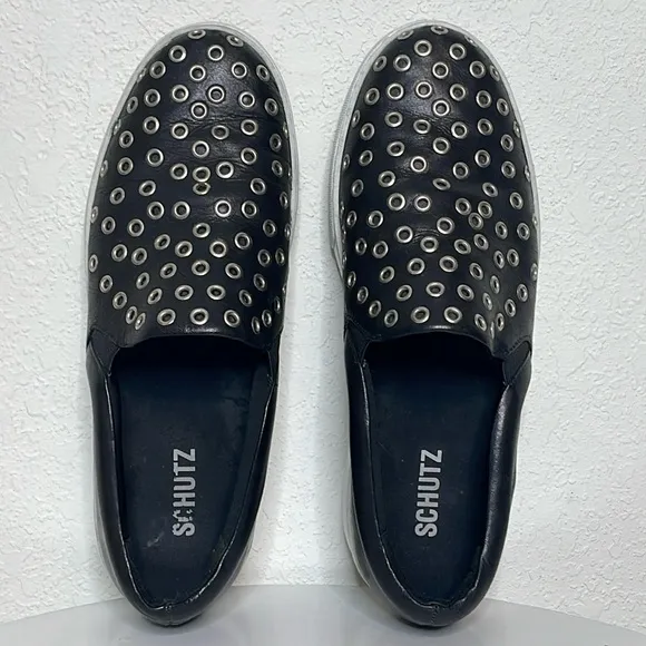 SCHUTZ GROMMET STUDDED BLACK LEATHER SLIP ON SNEAKERS