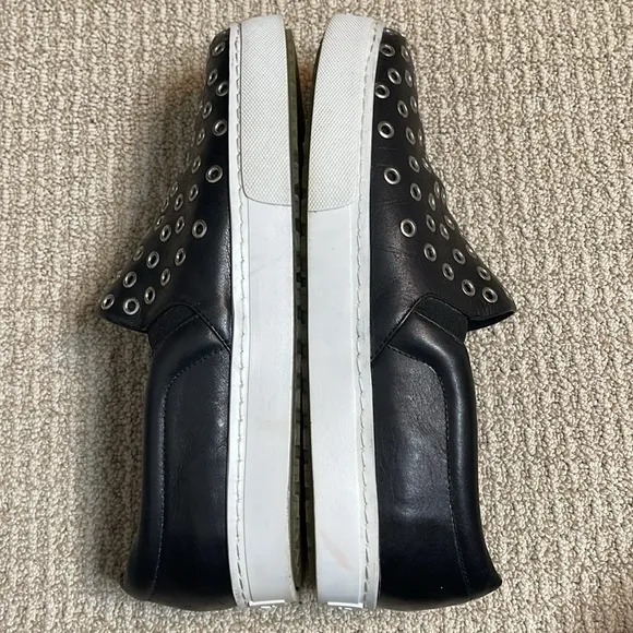 SCHUTZ GROMMET STUDDED BLACK LEATHER SLIP ON SNEAKERS